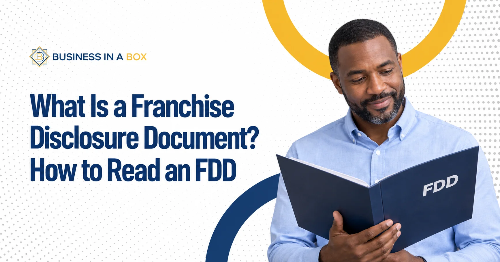 Man reviewing a franchise disclosure document beside the headline “What Is a Franchise Disclosure Document? How to Read an FDD” in Business in a Box branding.